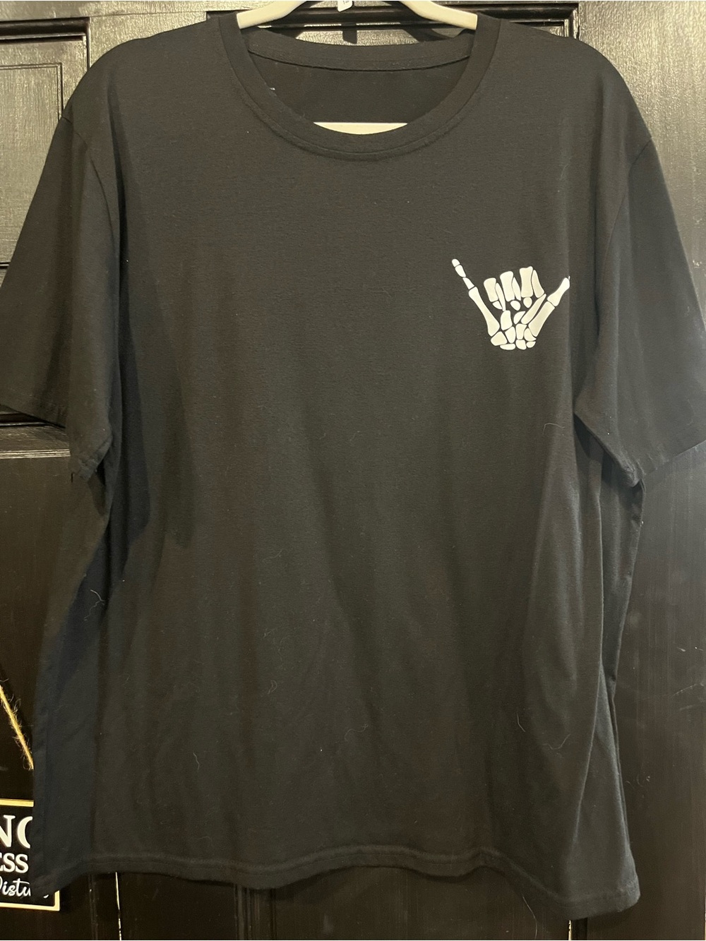 Black Men's Graphic Tee with White Skeleton Shaka